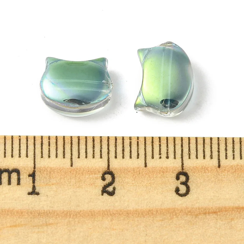 Glaspärlor - Katthuvud Grönolja 8x10mm 1 styck Hilmas Pyssel
