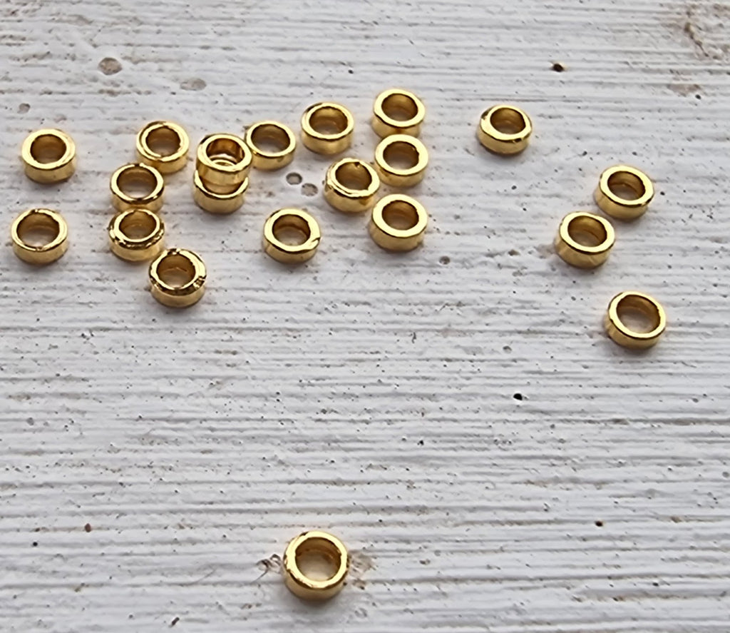 Mellandel 24k guldpläterad - Mini rondell 2x0.8mm 20-pack Grekisk Metall