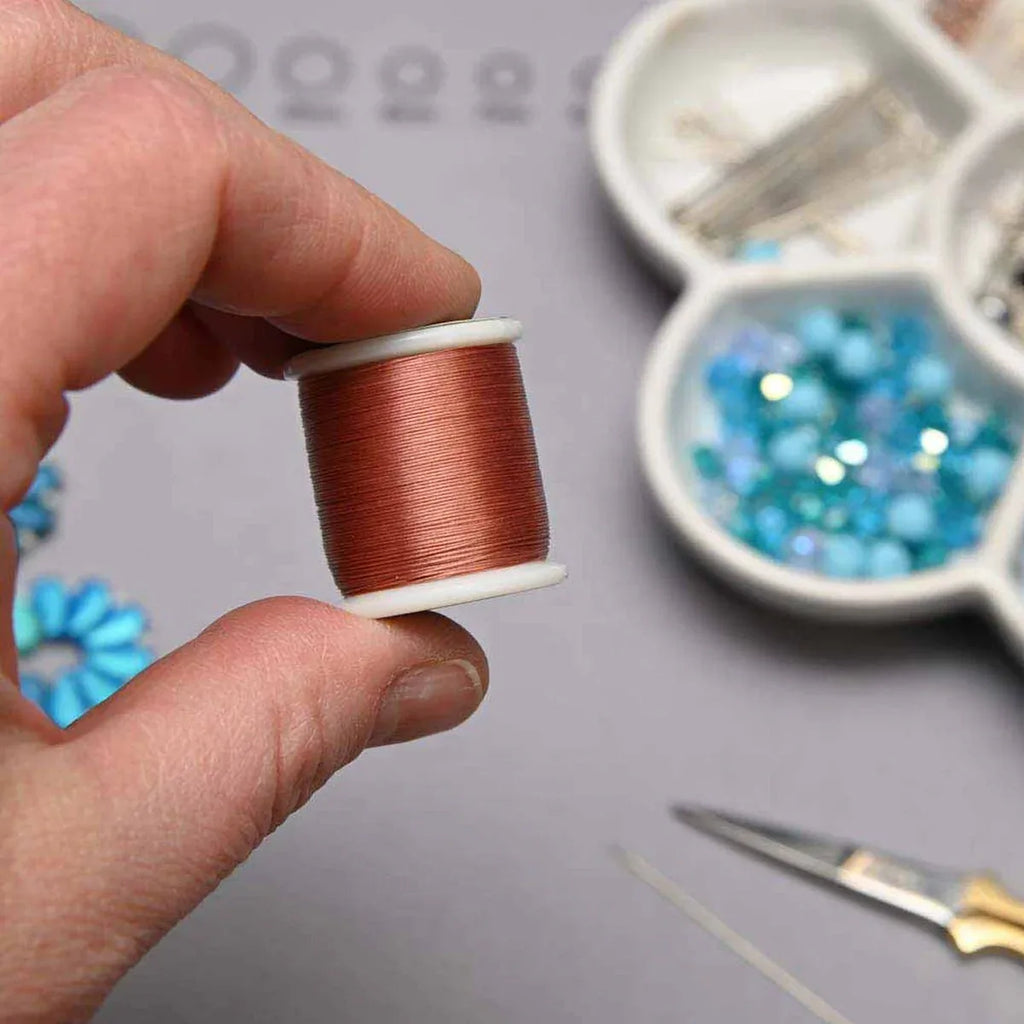 K.O pärltråd - Apricot, 1 rulle K.O Beading Thread