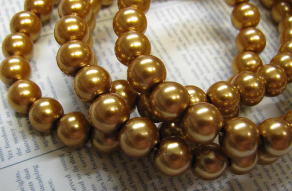 Vaxade glaspärlor - Guldbrun 8mm 1 sträng Hilmas Pyssel