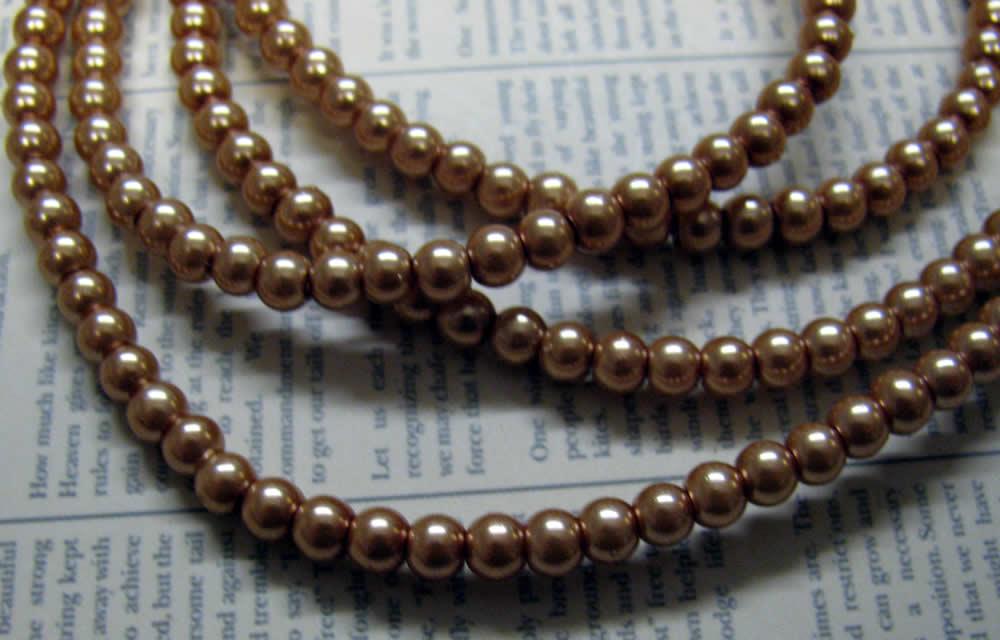 Vaxade glaspärlor - Mellanbrun 4mm 1 sträng Hilmas Pyssel