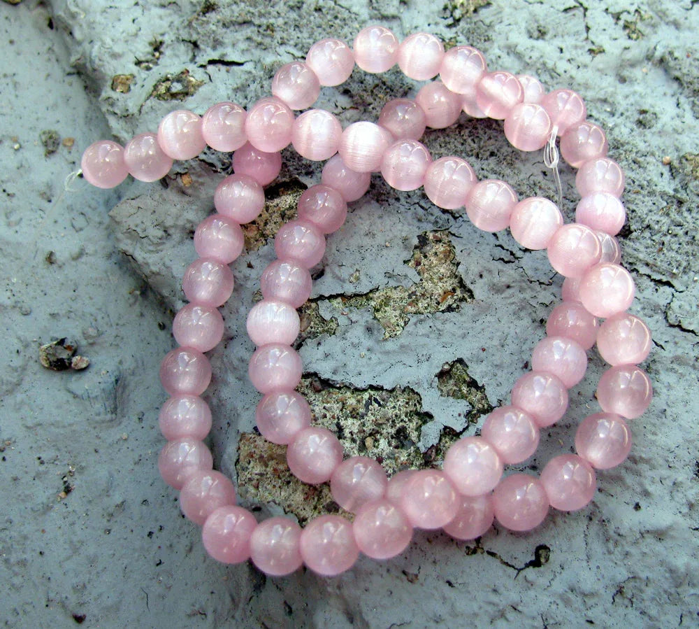 Cat's eye pärlor - Rund Rosa 6mm, 1 sträng Hilmas Pyssel