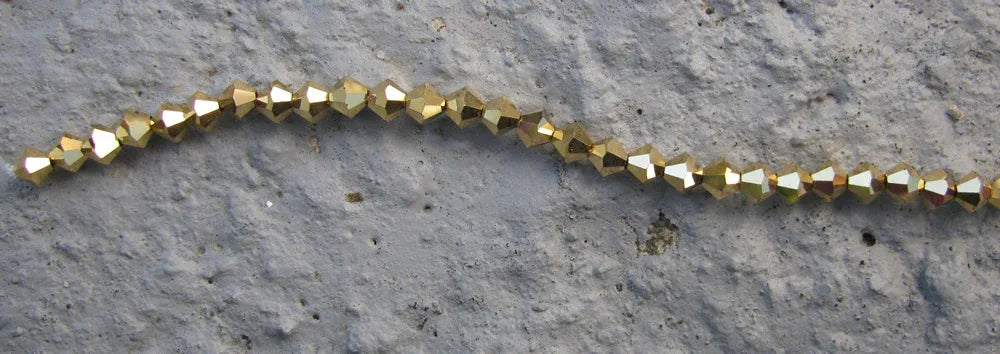 Tjeckiska MC Bicone - Crystal Aurum 4 mm, 1 sträng Preciosa