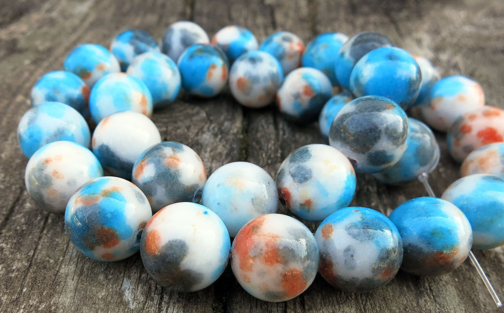 Jade flerfärgade runda - Turkos/svart/vit, 12mm 1 sträng Hilmas Pyssel