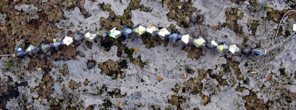 Tjeckiska MC Bicone - Crystal Heliotrope 6 mm, 1 sträng Preciosa