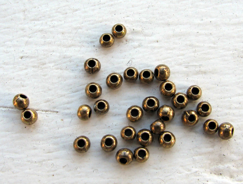 Mellandel bronsfärgad - Rund 3 mm, 30-pack Grekisk Metall