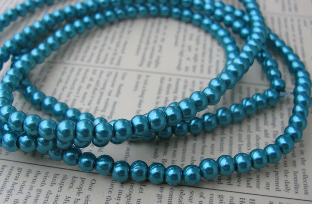 Vaxade glaspärlor - Mörkturkos (teal) 4mm 1 sträng Hilmas Pyssel