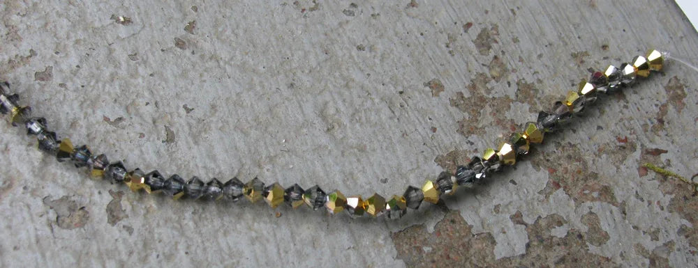 Tjeckiska MC Bicone - Crystal Aurum Half 3 mm, 40- pack Preciosa