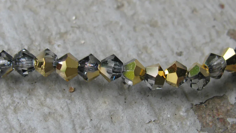 Tjeckiska MC Bicone - Crystal Aurum Half 3 mm, 40- pack Preciosa