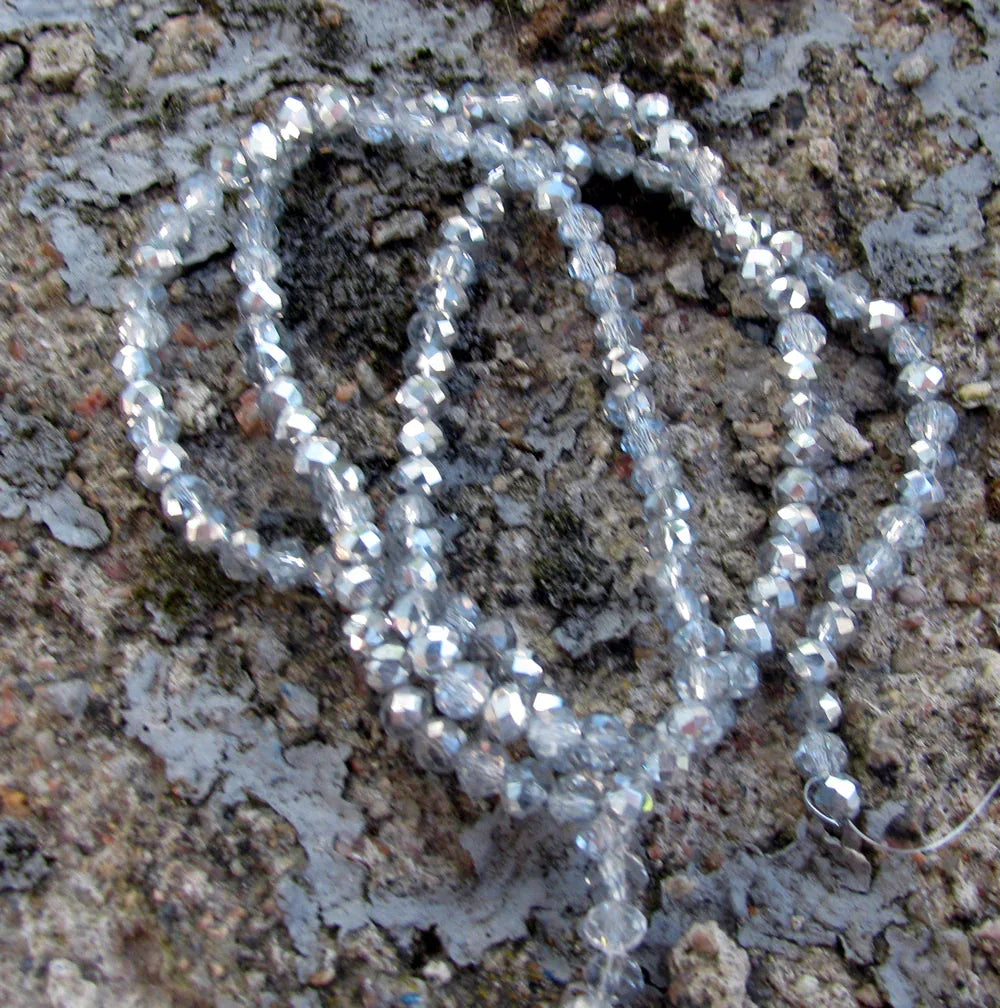 Facetterade glaspärlor - Klar/Silver, 4x3mm, 1 sträng Hilmas Pyssel