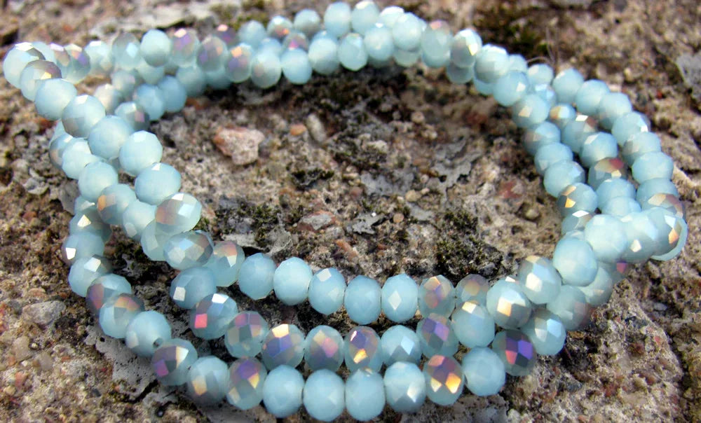 Facetterade glaspärlor - Turkos/Olja, 4x3mm, 1 sträng Hilmas Pyssel