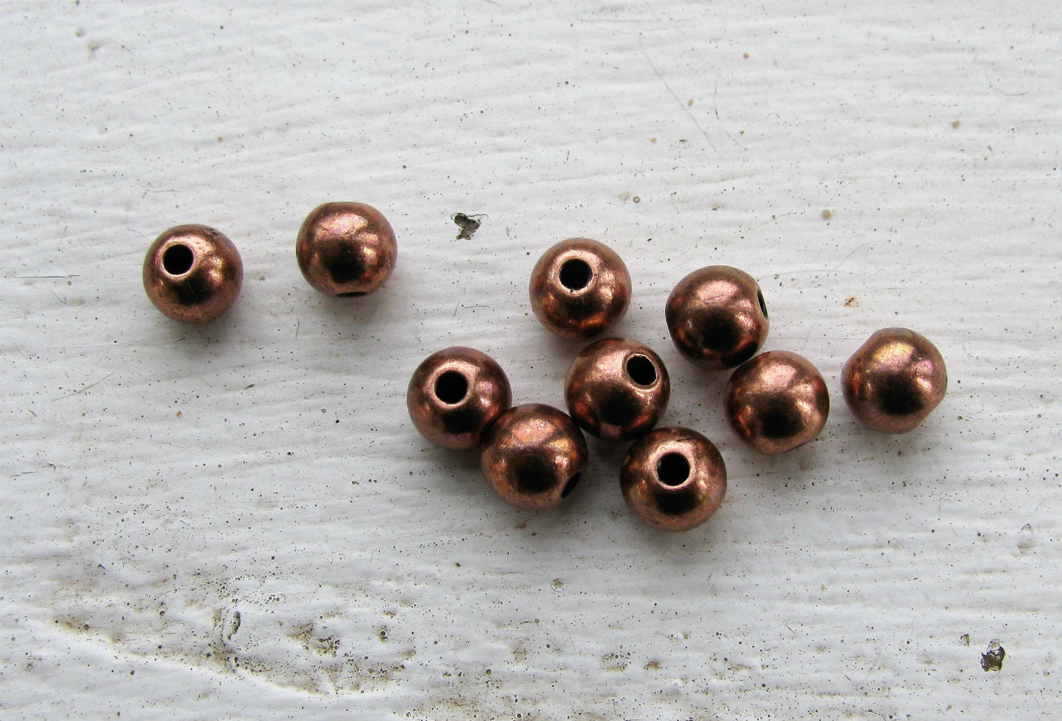 Mellandel Kopparfärgad - Rund 6mm 10-pack Grekisk Metall