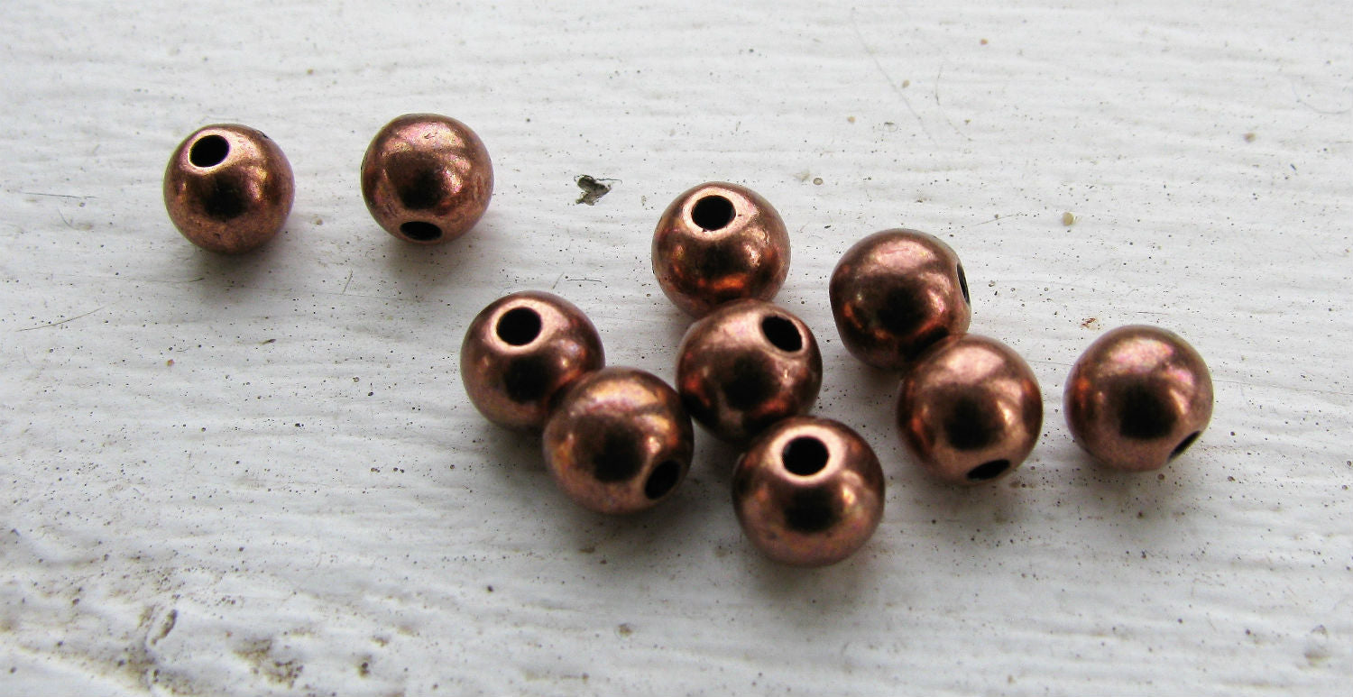 Mellandel Kopparfärgad - Rund 6mm 10-pack Grekisk Metall