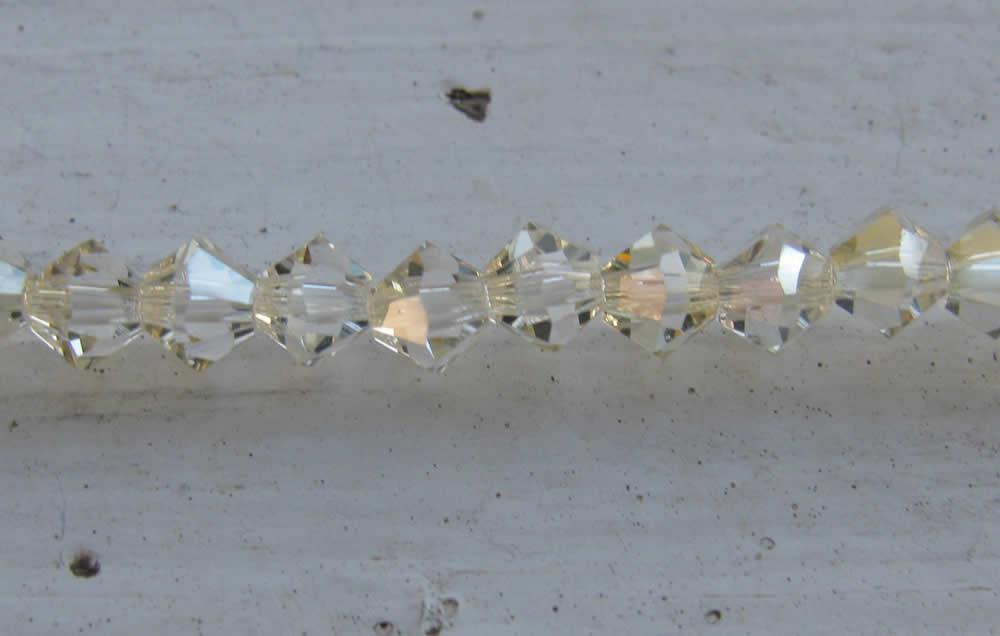 Tjeckiska MC Bicone - Crystal Blond Flare 4 mm, 1 sträng Preciosa
