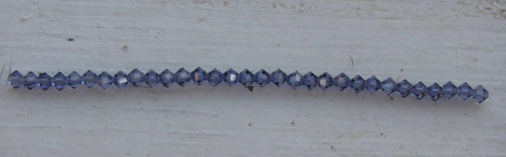 Tjeckiska MC Bicone - Tanzanite 4 mm, 1 sträng Preciosa