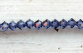 Tjeckiska MC Bicone - Tanzanite 4 mm, 1 sträng Preciosa