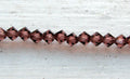 Tjeckiska MC Bicone - Light Burgundy 4 mm, 1 sträng Preciosa