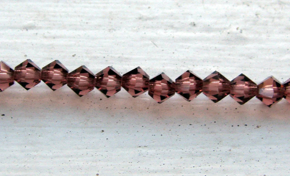 Tjeckiska MC Bicone - Light Burgundy 4 mm, 1 sträng Preciosa