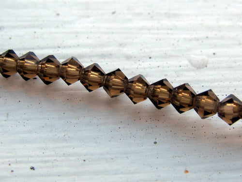 Tjeckiska MC Bicone - Smoked Topaz, 3 mm - 1 sträng Preciosa