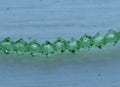 Tjeckiska MC Bicone - Peridot 3 mm, 1 sträng Preciosa