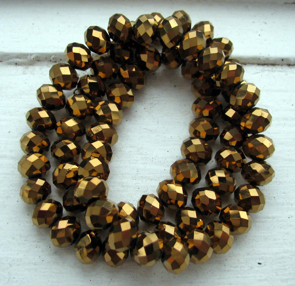 Facetterade glaspärlor - Elektropläterade Brons, 8x6mm 1 sträng Hilmas Pyssel
