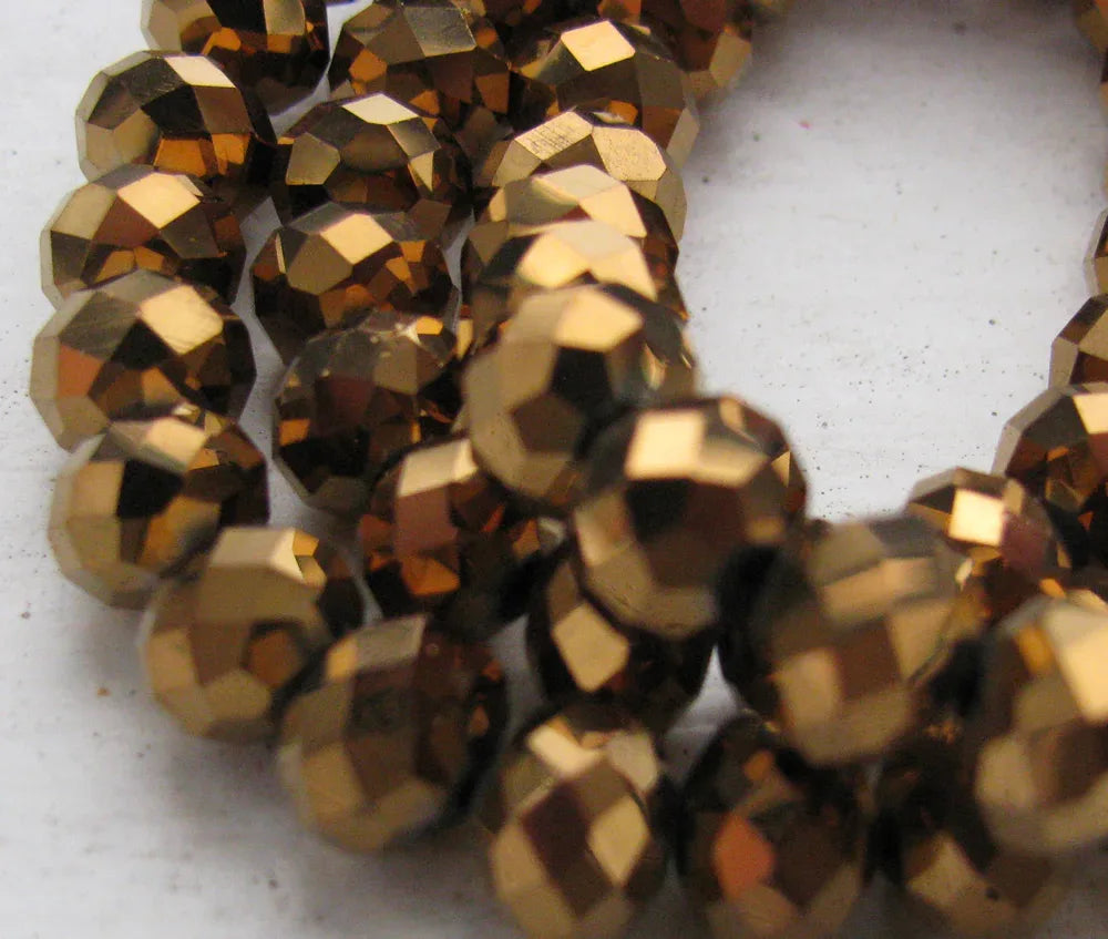 Facetterade glaspärlor - Elektropläterade Brons, 8x6mm 1 sträng Hilmas Pyssel