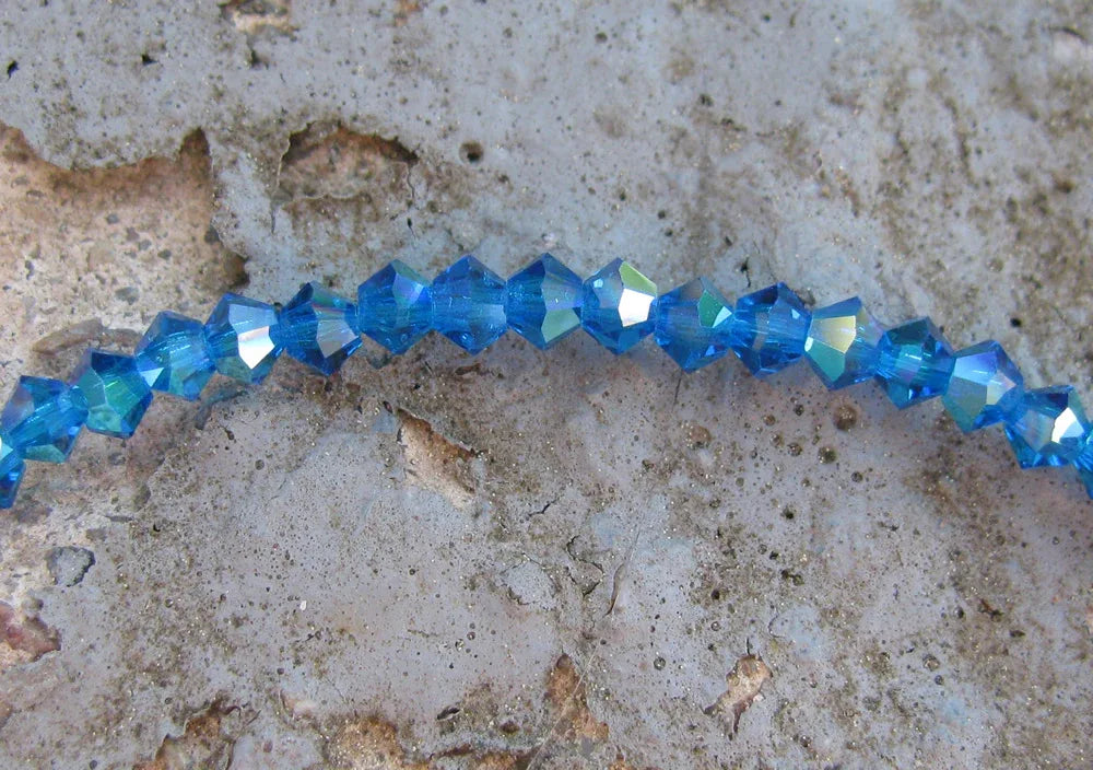 Tjeckiska MC Bicone - Capri Blue AB 3 mm, 1 sträng Preciosa