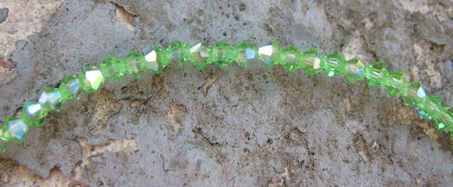 Tjeckiska MC Bicone - Peridot AB 3 mm, 1 sträng Preciosa
