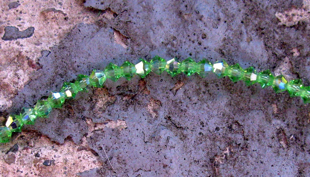 Tjeckiska MC Bicone - Peridot AB 3 mm, 1 sträng Preciosa