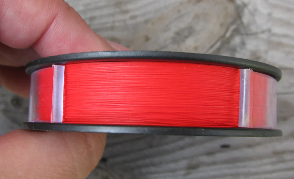 Wildfire 0,06 - Röd 50 yards Beadalon
