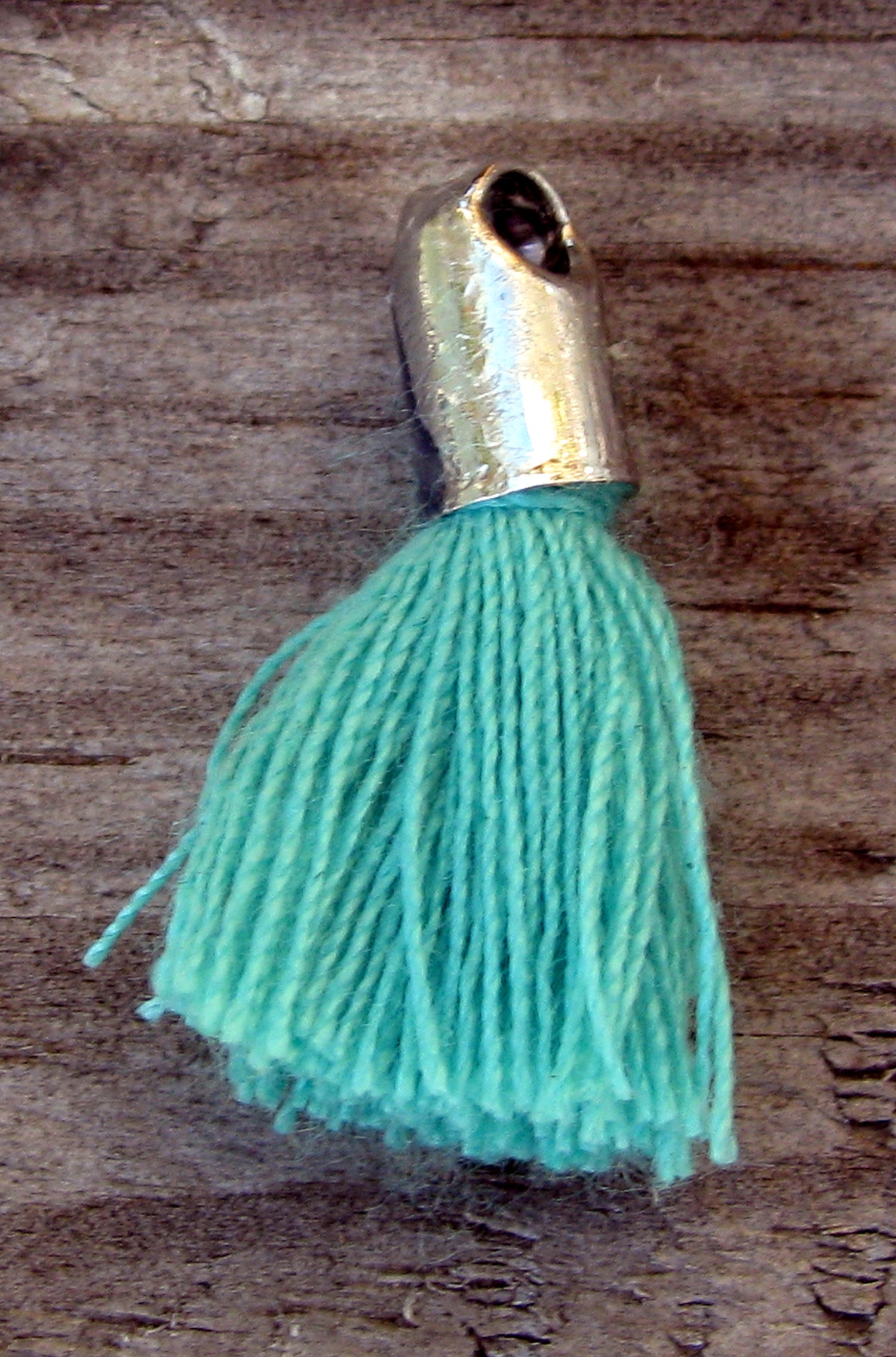 Bomullstofs - Grönturkos 18mm, 1 styck Grekisk Metall