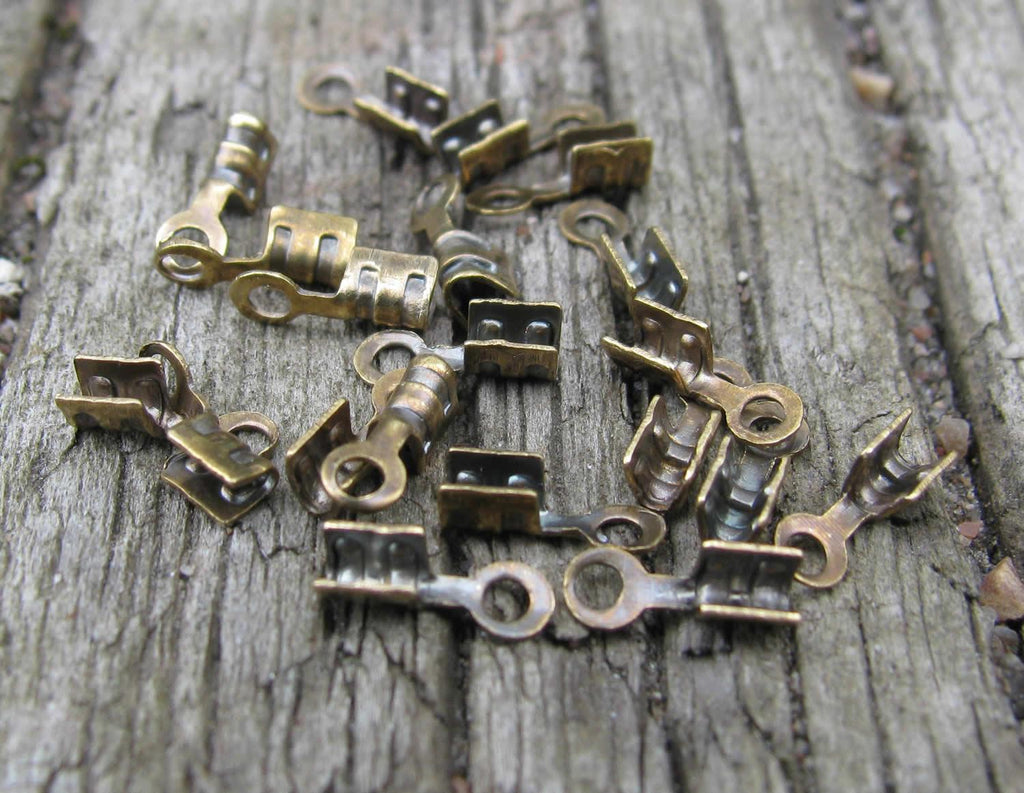 Fästen Bronsfärgade - För band 1 mm 20-pack Grekisk Metall