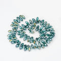 Facetterade droppar - Teal skimmer, 13x6mm, 1 sträng Hilmas Pyssel