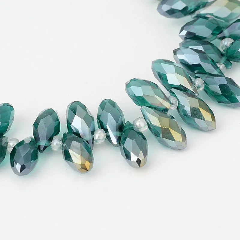 Facetterade droppar - Teal skimmer, 13x6mm, 1 sträng Hilmas Pyssel