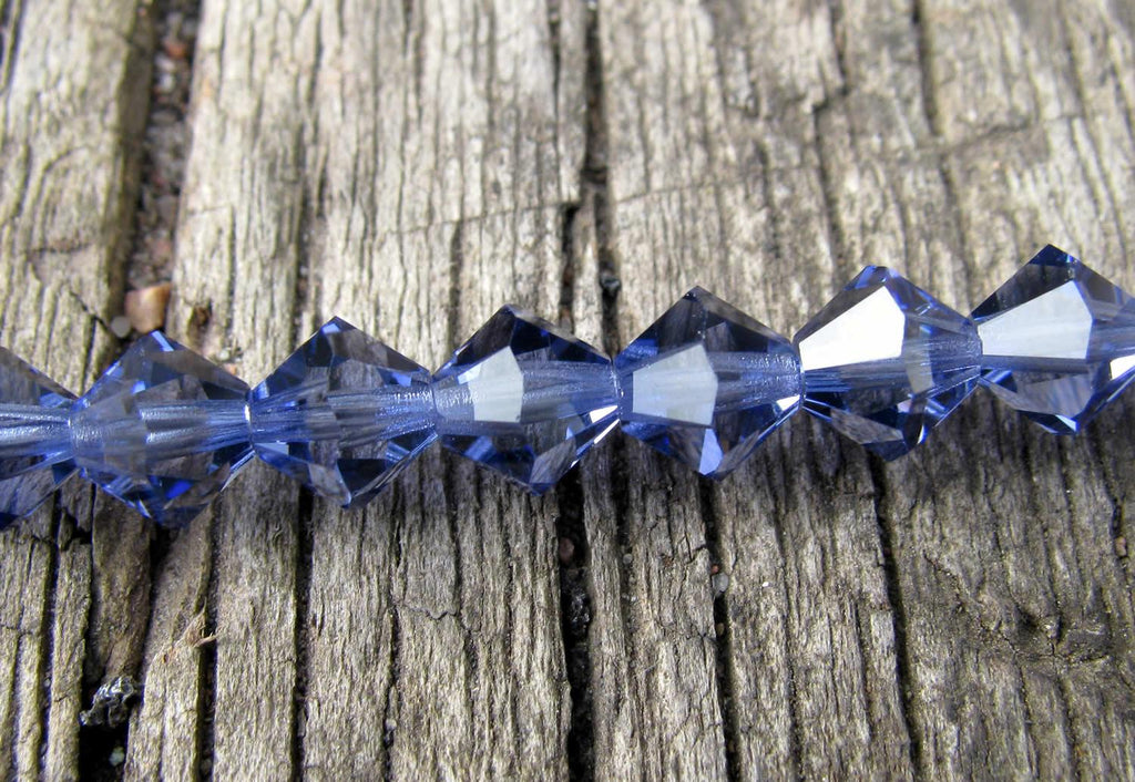 Tjeckiska MC Bicone - Tanzanite 6 mm, 1 sträng Preciosa