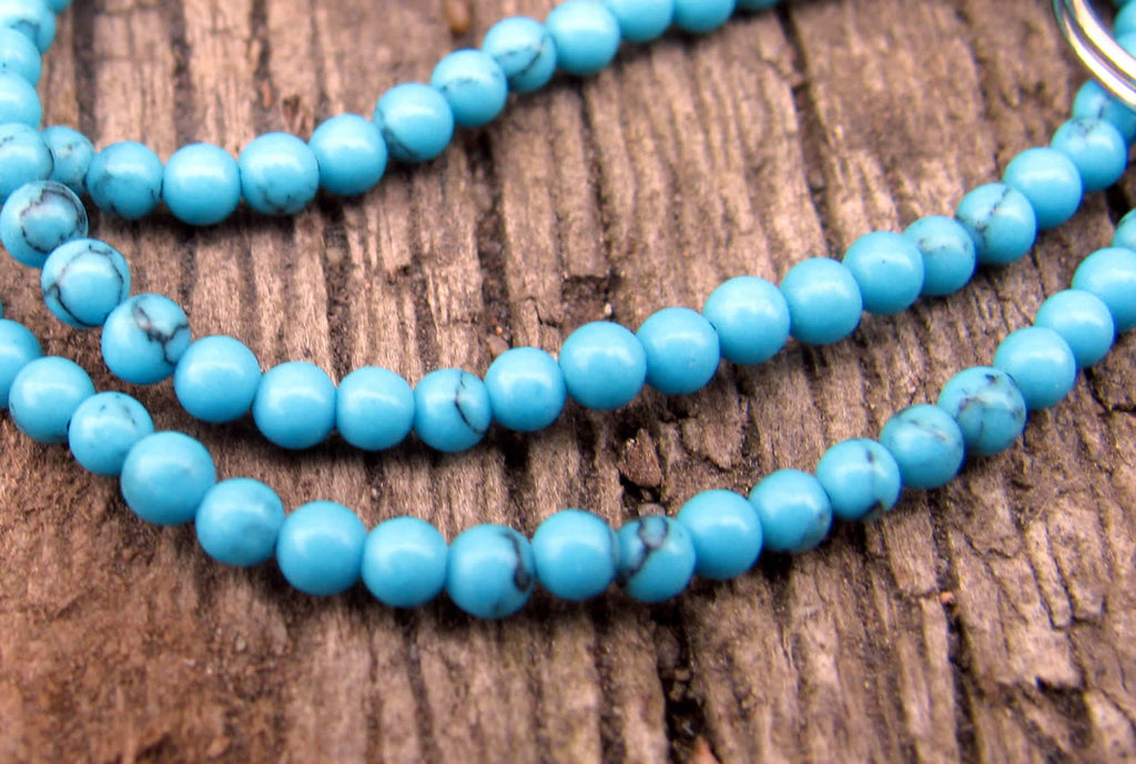 Imiterad Turkos - Rund Turkos, 2mm, 1 sträng Hilmas Pyssel