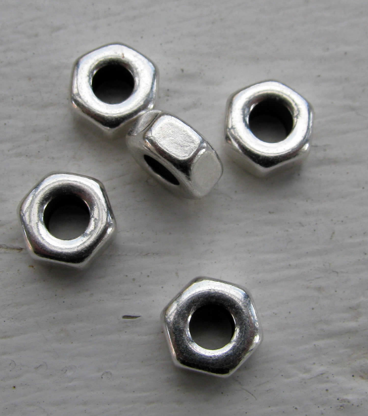Mellandel Silverfärgad - Mutter 8x4mm 5-pack Grekisk Metall