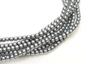 Tjeckiska vaxade glaspärlor - Grey 2mm, 1 sträng